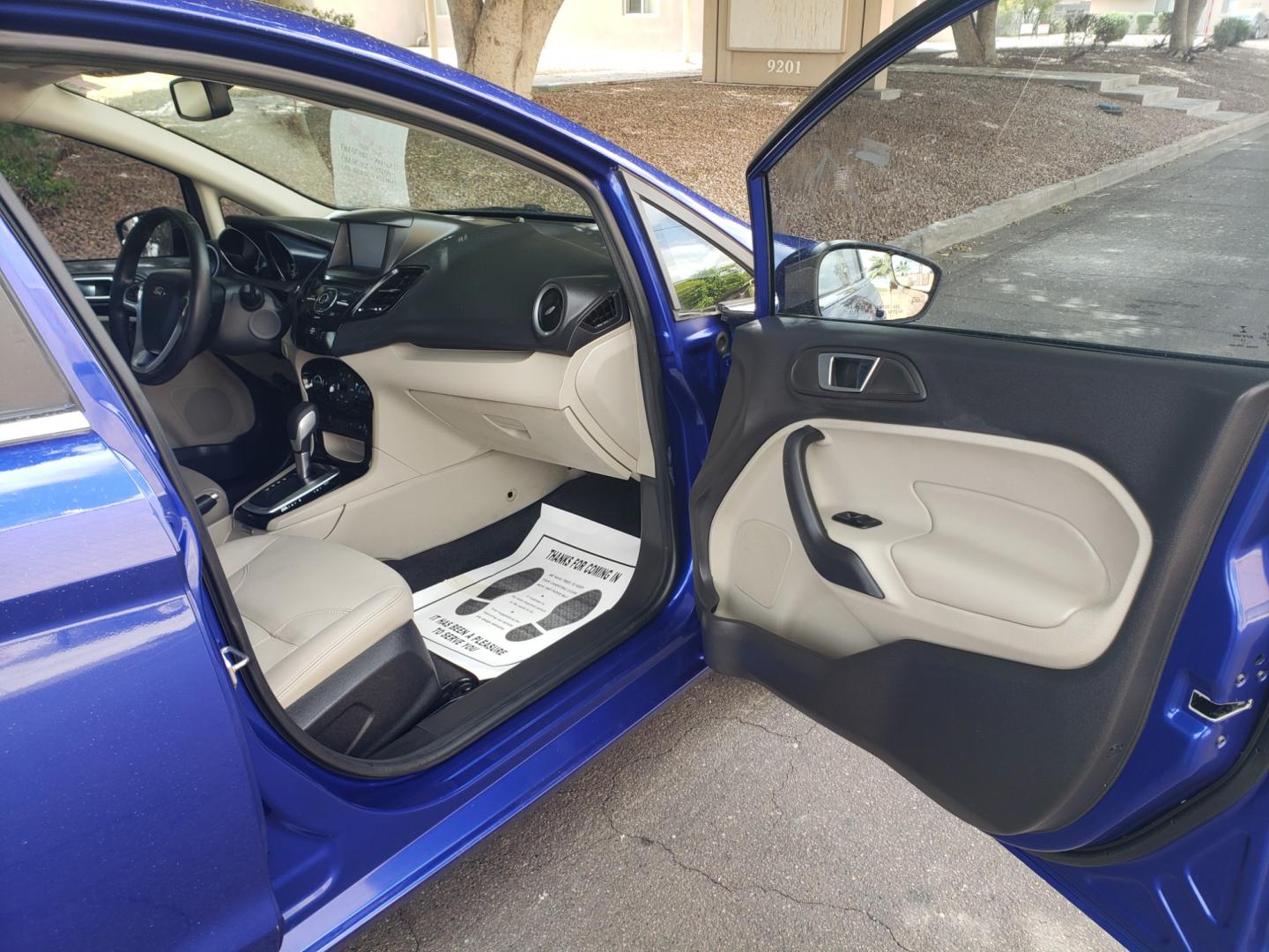 2014 /Tan and black Ford Fiesta Titanium (3FADP4FJ5EM) with an 1.6l i4 engine, 6-Speed Automatic transmission, located at 323 E Dunlap Ave., Phoenix, AZ, 85020, (602) 331-9000, 33.567677, -112.069000 - 2014 Ford Fiesta Titanium,.......A Must See!!... No accidents, Only 95K MILES.... Ice cold AC. The car is gorgeous inside and out. Power windows, Power door locks, Touch screen Stereo/ CD Player, Phone sync, Bluetooth, Satellite compatible, Backup camera, Beautiful tan and black interior with tan le - Photo#12